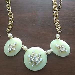 Faux gold necklace with cool designs.